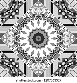 Vector geometrical seamless ornament. Seamless pattern in white, gray and black colors. Vector background with tiles and rhombus.