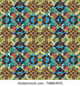 Vector geometrical seamless ornament. Seamless pattern in brown, yellow and blue colors. Vector background with tiles and rhombus.