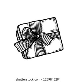 Vector of giff box with bow at black and white engraving style.