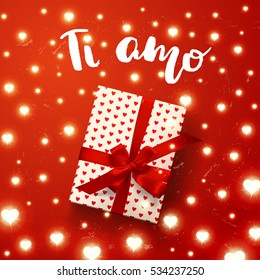 vector gift box with hearts, bow and ribbons, Glowing Lights on red background. Hand drawn calligraphy. concept handwritten "i love you" in Italian  