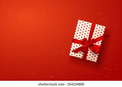 vector gift box with hearts, bows and ribbons on red background. valentine`s card 