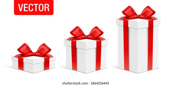 Vector gift box set. Set of different size white gift boxes, with a red satin bow, standing on a surface, isolated on background. Realistic holiday present box, tied with a red wrapping ribbon.