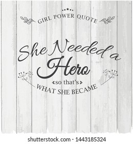 Vector Girls power motivation she need a hero on white wood background. Modern brush calligraphy. Graphic design element. Feminist quote. Digital print for poster, t shirt, postcard, clothing