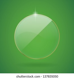 Vector glass circle in gold frame.