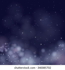 vector glittering stars on bokeh background