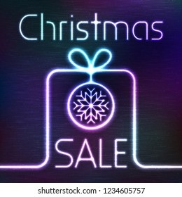 Vector Glowing Icon of Gift Box and Christmas Sale Words. Neon Sale Tag Shining on Dark Colorful Grunge Background