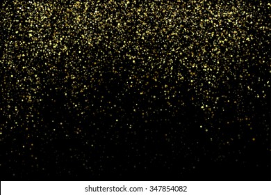 Vector gold glitter texture on a black background.