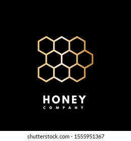 Vector gold honeycomb isolated on black background for your company design.