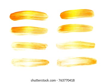 Vector gold paint smear stroke stain set. Abstract gold glittering textured art illustration. Gold Texture Paint Stain Illustration. Hand drawn brush strokes vector design elements. Acrilyc strokes.