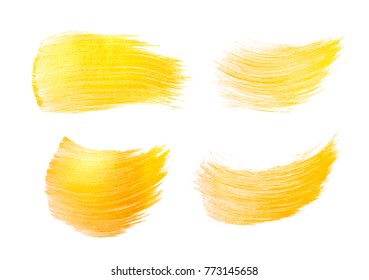 Vector gold paint smear stroke stain set. Abstract gold glittering textured art illustration. Gold Texture Paint Stain Illustration. Hand drawn brush strokes vector design elements. Acrilyc strokes.