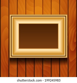 Vector gold picture frame on wooden wall.