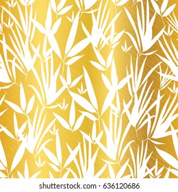 Vector Gold and White Bamboo Leaves Seamless Pattern Background. Great for tropical vacation fabric, cards, wedding invitations, wallpaper.