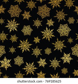 Vector golden and black snowflakes seamless repeat pattern background. Great for winter holiday fabric, giftwrap, packaging, covers, invitations.