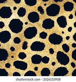 Vector golden cheetah skin seamless pattern. Abstract wild animal hand drawn leopard spots on gold metallic foil texture background for fashion print design, fabric, cover, wrapping paper, wallpaper.