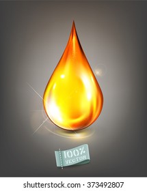 vector golden drop of oil on a gray background