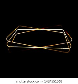 Vector Golden Frame with Glittering Sparkles. Shining polygonal banner. Isolated on black  background Design element.