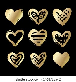 Vector golden hearts.Ink and paint  textures set of grungy hand drawn elements for your design isolated on black background
