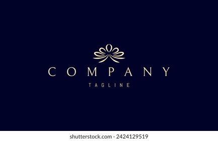 A vector golden logo with an abstract image of a ribbon bow in the form of a flower.