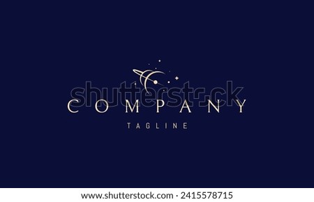 A vector golden logo with an abstract image of two planets with an orbit against a background of stars.