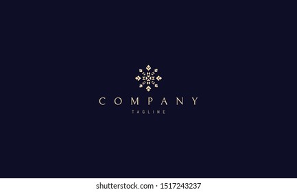 Vector golden logo on which an abstract image of a sidewalk snowflake.