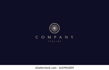 Vector golden logo on which an abstract image of a round pattern.