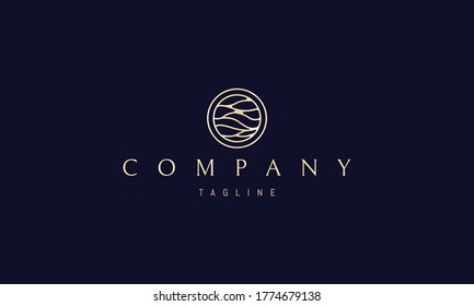 Vector golden logo on which an abstract image of sea waves in a circle.