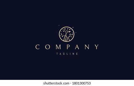 Vector golden logo on which an abstract image of several branches with leaves in a circle.