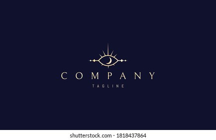 Vector golden logo on which an abstract image of an eye in the form of an alchemical sign.