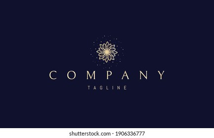 Vector golden logo on which an abstract image of a flower pattern in the form of a galaxy.