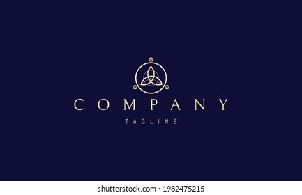 Vector golden logo on which an abstract image of a celtic pattern with a shamrock in a circle.