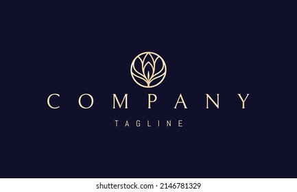 Vector golden logo on which an abstract image of branches and leaves in a circle in the form of a candle.
