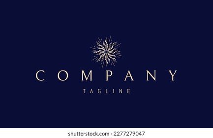 Logotipo vectorial dorado en el que una imagen abstracta de un patrón lineal en forma de sol.