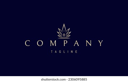 Vector golden logo on which an abstract image of leaves in the form of a shining candle.