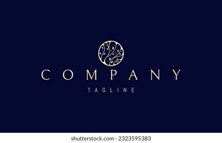 Vector golden logo on which an abstract image of plants with leaves in a circle.