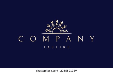 Vector golden logo on which an abstract image of a sunrise where the rays are tree branches with leaves.