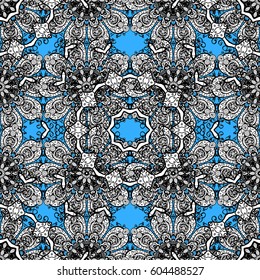 Vector golden mehndi seamless pattern. Ornamental floral elements with henna tattoo, golden stickers, mehndi and yoga design, cards and prints. Pattern on blue background with golden elements.