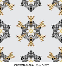 Vector golden mehndi seamless pattern. Ornamental floral elements with henna tattoo, golden stickers, mehndi and yoga design, cards and prints. Pattern on gray background with golden elements.