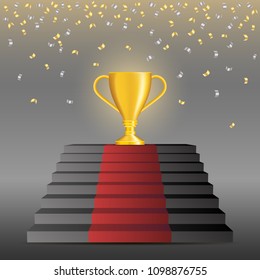 Vector of golden trophy on top of stairs with red carpet and golden and silver confetti.