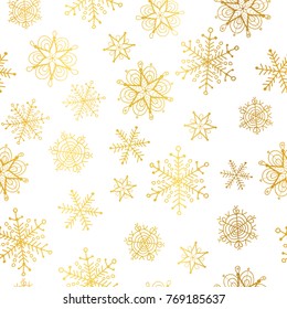 Vector golden and white snowflakes seamless repeat pattern background. Great for winter holiday fabric, giftwrap, packaging, covers, invitations.