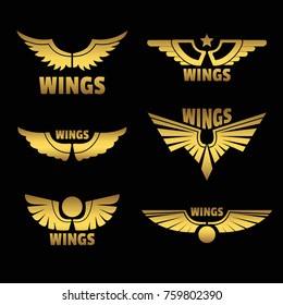 Vector golden wings logo on black background. Collection of realistic golden wings objects, vector illustration