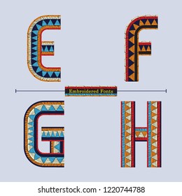 Vektorgrafik-Alphabet in einem Satz E,F,G,H, mit bestickten Stofffonts mit kalligrafischem Buchstabenstil