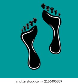 vector graphic illustration of footprints isolated on green.