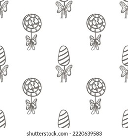 Vector graphic seamless pattern with sweets, candies, cupcakes, lollipops on a white background