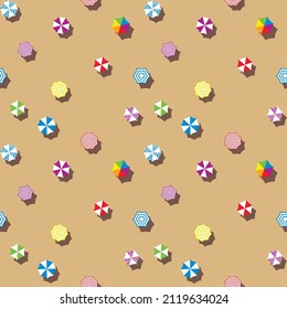 Vector graphics is a seamless abstract pattern with numerous colorful beach umbrellas on a sandy beach. Concept - summer vacation