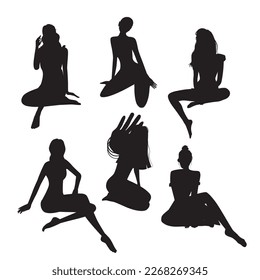 Vector graphics set of different vector black silhouettes of girls in a sitting pose