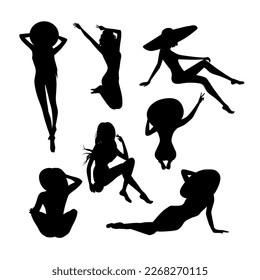 Vector graphics set of different silhouettes of girls in a hat for design