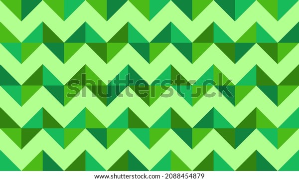Vector green abstract background. Chevron made with random green triangles. Graphic design for print, decoration. Mural with green gradient colors. Vector illustration. 
