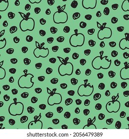 Vector green apple doodle seamless pattern. Hand drawn, fun and lighthearted design. Perfect for fabric, wallpaper, scrapbooking and stationery.