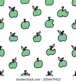 Vector green apple polka dots on a white background seamless pattern. Hand drawn, fun and lighthearted design. Perfect for fabric, wallpaper, scrapbooking and stationery.