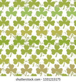 Vector green clover seamless pattern isolated on a white background
